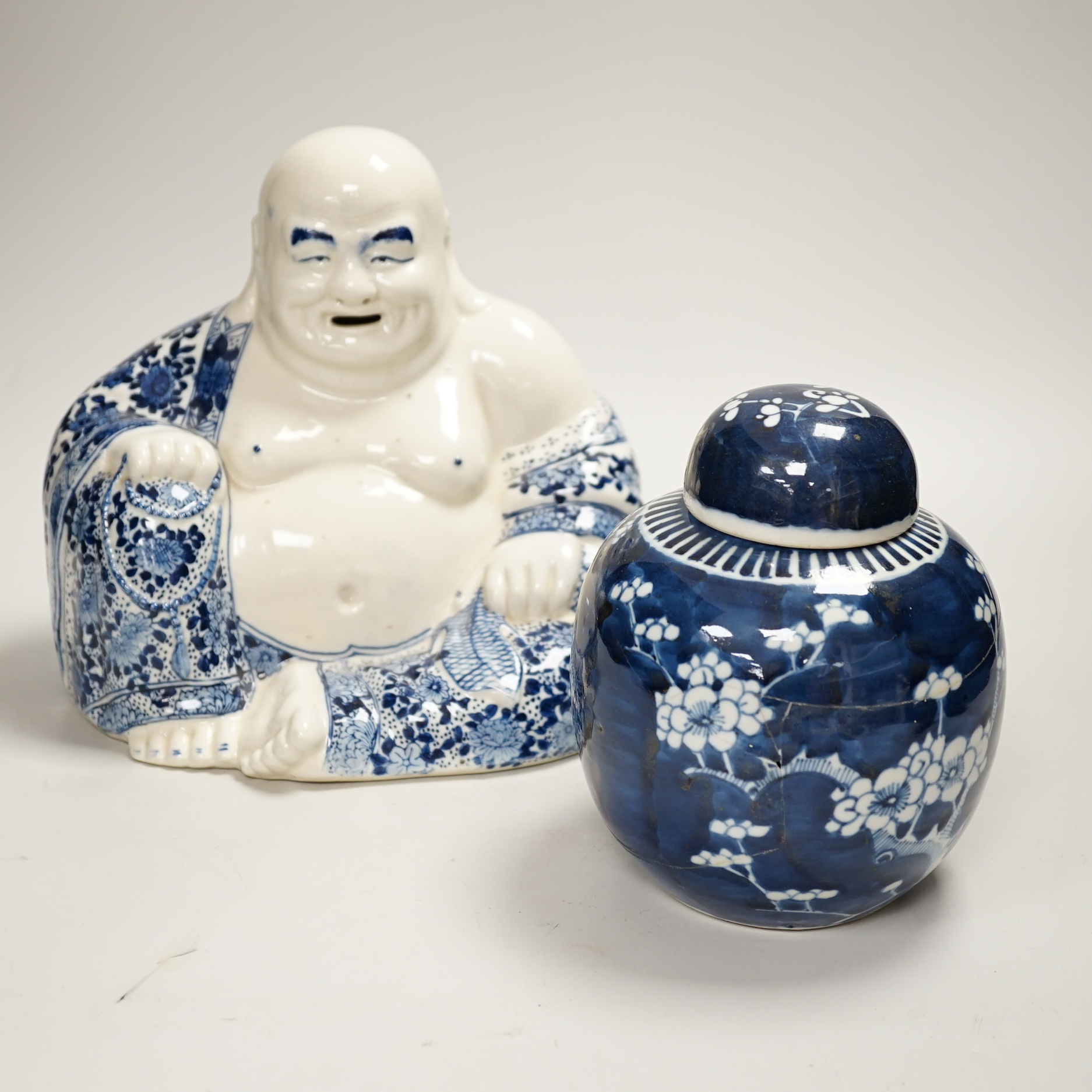 Chinese ceramics including a Buddha, prunus flower ginger jar and plates, the largest 26cm high